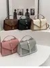 Moda tejida transfronteriza de tendencia versión coreana cinturón de cuero bolso de hombro único casual de principios de primavera color liso bolso cuadrado pequeño cruzado
