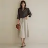 Ropa de Mujer de Comercio Exterior Estilo Coreano Falda Media Irregular de Retazos de Algodón y Lino con Dobladillo Ancho, Novedad Verano 2025 Falda de Cintura Alta Adelgazante que Cubre el Vientre