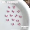 Conjunto Misto de Decorações para Unhas com Laços de Resina Rosa de 12 Peças, Acessórios Populares 3D de Laços para Unhas DIY