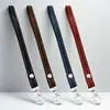 Cuerda para la muñeca con llavero de hebilla Lanyard para teléfono móvil Colgante de regalo anti-pérdida Estilo corto Fabricante Venta al por mayor