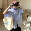 Camisa de botones a rayas estilo americano para hombres y mujeres, marca de moda de verano, estilo universitario, camisa casual holgada versátil de alta costura para parejas