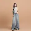 26 Coleção de primavera transfronteiriça nova: Calça jeans azul estilo americano com sal marinho, design solto, perna larga e comprimento até o chão, disponível para dropshipping