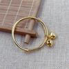 Pulsera de aleación para niños con cierre de campana, étnica para bebé, push-pull, dorada, plateada, venta al por mayor de productos básicos de Yiwu