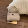 Bolso de Hombro de Moda de Estilo Coreano de Alta Apariencia para Mujer 2026 Primavera Nuevo Estilo Bolso Cuadrado Pequeño Cruzado Simple y de Moda