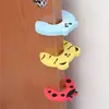 Produtos infantis em estoque: Clipe de porta de EVA, Batente de porta anti-aperto para bebê, Protetor de porta de esponja anti-aperto de mão com desenho