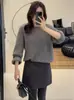 Falda de alta gama europea, temperamento exquisito, brillo fino, línea A para mujer, popular otoño e invierno 2024, falda ajustada que cubre la carne en la cadera