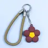 Colgante de Taza de Agua de Goma Suave de PVC Colgante de Flor Colorida Dopamina Llavero DIY Adorno de Flor Pequeña