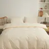 Conjunto de quatro peças liso de cor sólida estilo japonês direto da fábrica, protetor de lençol de elástico simples escovado, item único de lençol de elástico lavável