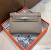 Bolso Kelly Mini de Primera Generación para Mujer Bolso de Mano de Piel de Vaca Swift de Primera Capa Importada Bolso de Mano con Color de Contraste Bolso Pequeño Cruzado con Cadena para Mujer