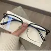 Nuevos lentes para hombre estilo retro, modernos y elegantes, diseñados para hombres conocedores de la tecnología, con lentes transparentes, bloqueo de luz azul y un refinado diseño de media montura