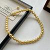 Collar de Perlas Doradas Lujo Ligero Nicho Nuevas Explosiones Cadena para Clavícula Versátil Cadena de Lana Clásica Redonda Luz Fuerte