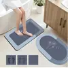 Alfombrilla de suelo moderna minimalista de tierra de diatomeas, fácil de mantener, resistente al desgaste, juego de tres piezas para baño y inodoro, alfombrilla antideslizante al por mayor