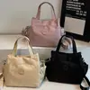Bolsa casual, simples e estilosa, novo design de nicho de luxo leve, alto valor estético, grande capacidade, multi-compartimentos, de ombro, transversal, bolsa de mão