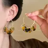 Pendientes Retro Marrones de Serpentina Ámbar Estampado Floral de Leopardo Metal Desgastado Alargadores Faciales Moda Única Pendientes para Mujer