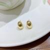 Pendientes de botón con forma de frijol de estilo metal con aguja de plata S925 para mujer, sencillos, pequeños y elegantes, en línea, de celebridades, joyería francesa de alta calidad.