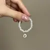 Mini Labubu Cuarta Generación Caja Sorpresa Ropa de Muñeca Collar Colgante Labubu 26 Letras Collar de Perlas Accesorios de Joyería