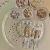 Uñas postizas estilo Xiaohongshu para Navidad, lámina de cobre ultrafina, lazo, estrella explosiva, letra, lentejuela, con sensación de alta gama, accesorios de arte de uñas