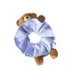 Acessórios de cabelo de urso de pelúcia xadrez estilo coreano, um acessório de cabelo fofo e versátil para meninas, perfeito para estilizar cabelos curtos, e um elástico de cabelo moderno para lavar o rosto