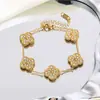 Pulsera de trébol de cuatro hojas de doble cara con incrustaciones de diamantes del fabricante, joyería de acero de titanio 18k para mujer de la suerte, no se decolora, producto más vendido transfronterizo