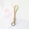 Lanyard moderno para teléfono móvil, accesorio de juguete tipo pulsera, correa tejida para taza de teléfono móvil, correa duradera para ventilador de mano