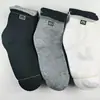 Calcetines Zhuji Calcetines de Media Caña para Hombre Letra Transpirables Casual de Negocios Deportivos Calcetines para Hombre Protección Laboral Calcetines Desechables para Hombre Venta al por Mayor
