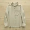 Camisa de Manga Larga Cepillada con Bolsillo en el Pecho y Cuello Puntiagudo Artístico Estilo Japonés para Mujer Colección Primavera 2026 Camisa Casual Venta al por Mayor