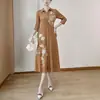 Nuevo vestido de otoño con cuello camisero, diseño estampado, manga tres cuartos, corte holgado, estilo elegante para madres de mediana edad, vestido de longitud media Issey Miyake