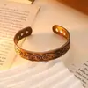 Europa y Estados Unidos apertura transfronteriza pulsera anillo traje imán vintage motocicleta tallado tótem pulsera anillo joyería al por mayor