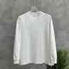 Camiseta de manga comprida com gola redonda e cor sólida estilo americano, uma peça versátil e casual para camadas de outono para homens, apresentando um corte solto, design moderno e um estilo novo e simples