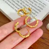 Ouro Real 24K Galvanoplastia a Vácuo Retenção Forte de Cor Brilhantes Brincos Design de Nicho para Casal Brincos de Luxo Acessível High-End