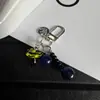 Colgante redondo de cuentas de hongo lindo de dopamina colorida nuevo llavero multifuncional versátil accesorio para bolso