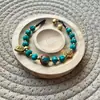 Pulseira de Usar Reto em Liga de Zinco com Pingentes de Óleo de Cera de Abelha Imitação Estilo Étnico Retro Transfronteiriço Pulseira Tecida à Mão com Contas do Nepal