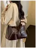 Bolsa Tote de Gran Capacidad Bolso de Hombro Sencillo de Color Sólido Otoño 2026 Nuevo Bolso Cruzado de Moda de Alto Valor para el Trabajo Tendencia
