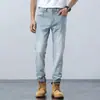 Jeans Masculino Slim Straight de Lyocell Tencel, Denim Azul Elástico Bordado Primavera/Verão, Em Estoque
