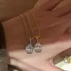 Bestseller de Xiaohongshu Collar Huevo de Paloma Super Brillante para Mujer Nueva Moda Lujo Ligero Diseño de Nicho Cadena Versátil para Clavícula para Mujeres