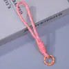 Nuevo cordón tejido de colores con encaje anudado, correa de muñeca anti-pérdida para teléfonos móviles, accesorio de llavero de muñeca hecho a mano