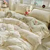 Nuevo modelo 2025 juego de ropa de cama de algodón de cuatro piezas con encaje de algodón, funda de edredón, sábana, juego de ropa de cama de tres piezas para dormitorio
