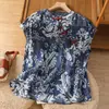 2026 Verano Nuevo Holgado Casual Retro Estilo Artístico Botón de Rana Suéter Top Estampado Camisa Mujer