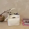 Bolsa tote casual estilo coreano transfronteiriça, bolsa Kelly para mulheres, nova coleção primavera/verão 2026, bolsa de ombro de alta qualidade para exportação