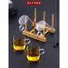 Taza de té pequeña de vidrio con asa transparente gruesa resistente al calor mini taza de té para el hogar juego de té Kung Fu