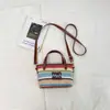 Bolsa de palha trançada feminina transfronteiriça novo modelo 2026 estilo férias na praia bolsa transversal trançada bolsa de balde de mão de verão