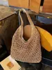 Bolsa tejida de verano calada para mujer, nuevo estilo 2026, bolsa de playa de gran capacidad para vacaciones junto al mar