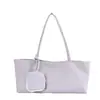 Moda minimalista coreana y japonesa 2026 verano nuevo para mujer de alta gama versátil para ir al trabajo nicho bolso de mano de un solo hombro bolso tote