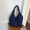 Elegante bolsa de mano estilo perezoso Xiaomi para mujer 2026 nueva bolsa ligera de gran capacidad de un solo hombro para el día a día y el trabajo bolsa de axila
