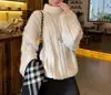 Suéter de gola alta em tricô de tranças liso estilo coreano para mulheres, nova coleção de inverno, com um design relaxado e estiloso, perfeito como uma camada interna de caimento solto.