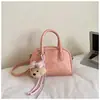 Bolso tipo cubo de alta apariencia para mujer 2026 Nuevo estilo japonés Fresco Bolso de hombro cruzado de mano Ligero Bolso para el día a día