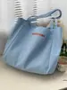 Bolsa de Hombro tipo Satchel de Lona Color Caramelo con Letras Japonesas y Coreanas Bolsa de Clase para Estudiantes Ins Bolsa de Compras Simple Ecológica