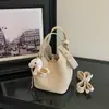 Bolsa de mão feminina transfronteiriça, nova coleção outono 2026, bolsa tipo balde moderna e fashion, bolsa de ombro e bolsa transversal versátil