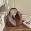 Bolso tote casual retro de gran capacidad para mujer, con un nuevo diseño de moda con textura de piedra, simple y elegante, perfecto como bolso de hombro o de axila