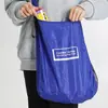 Bolso de mano doméstico divertido y portátil, bolsa de compras portátil retráctil, bolsa de almacenamiento cruzada multifuncional portátil en forma de disco para salidas